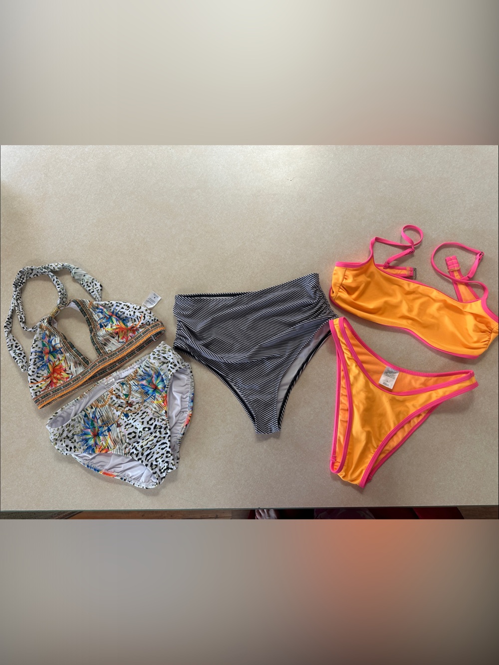 2 Ladies bikinis and a pair of swim bottoms all size 8 or L